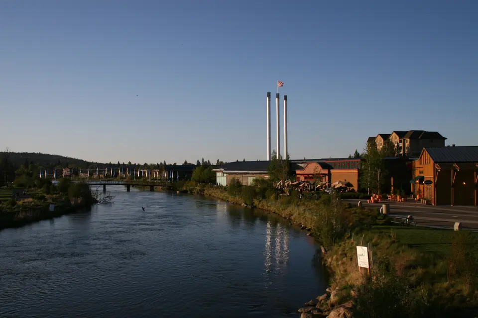 Deschutes River and Old Mill smokestacks in Bend, Oregon